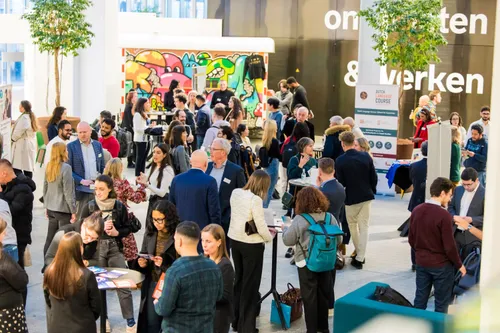 attendees of the 2025 edition of the International Welcome Event, organised by Rotterdam International Center at the Timmerhuis