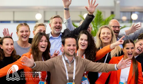 Photo of a group of enthousiastic PCMA EMEA participants posing for the camera