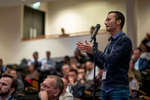 Speaker in the audience at StressWave 2022 congress, Rotterdam