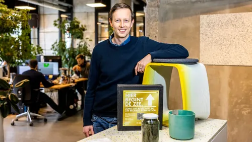 Photo: Bart Bleijerveld of Better Future Factory posing at BlueCity, Rotterdam's hub for circular economy innovation.