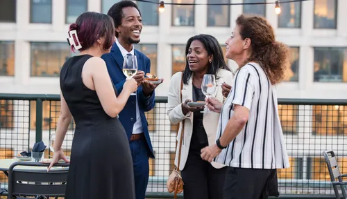 Photo: business people chatting at the Red Carpet Dinner