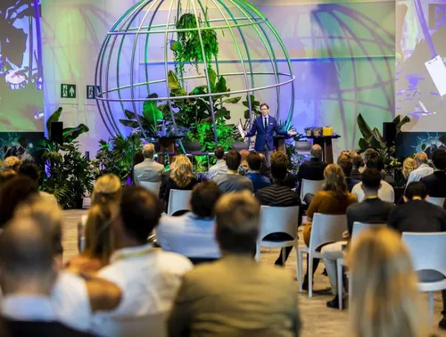 Captivated audience listening to a keynote address during an event at Rotterdam Ahoy Convention Centre in Rotterdam.