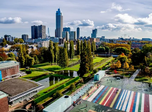 Photo: part of Rotterdam's skyline, with Museum Park in the foreground.