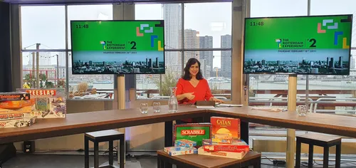 Photo of a lady hosting a hybrid event from a location in Rotterdam