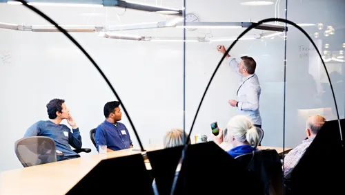 Photo: entrepreneurs discussing their project at Venture café.