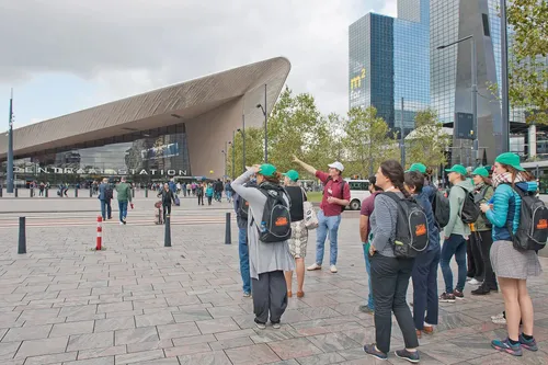 Photo of a tour group in front of Rotterdam Centraal Station