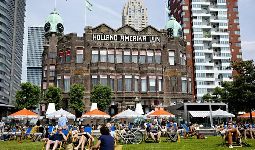 The façade of the Hotel New York building with Holland America Line stated at the top.