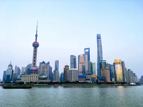 Photo: skyline, water and ship in Shanghai, China. Photo by John Appleseed